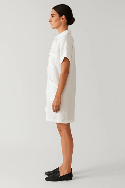 Lange blouse met borstzakken en omgeslagen mouwen