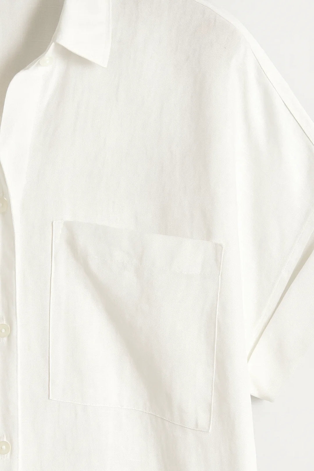 Lange blouse met borstzakken en omgeslagen mouwen