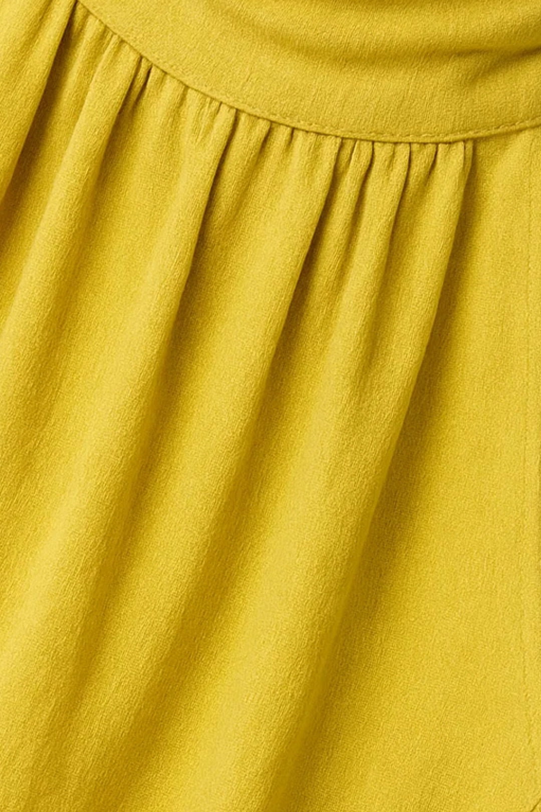 Kort limoengeel jurkje zonder mouwen | Hoge geplooide hals